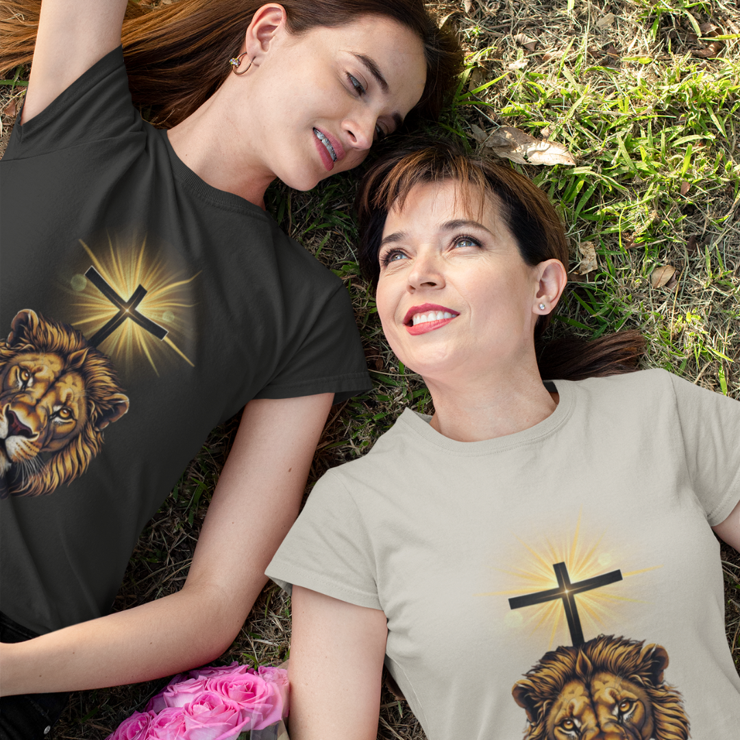 King of Kings Unisex Tee featuring a bold graphic of a lion and a cross, symbolizing strength and faith – available at Reach Love Connect Boutique