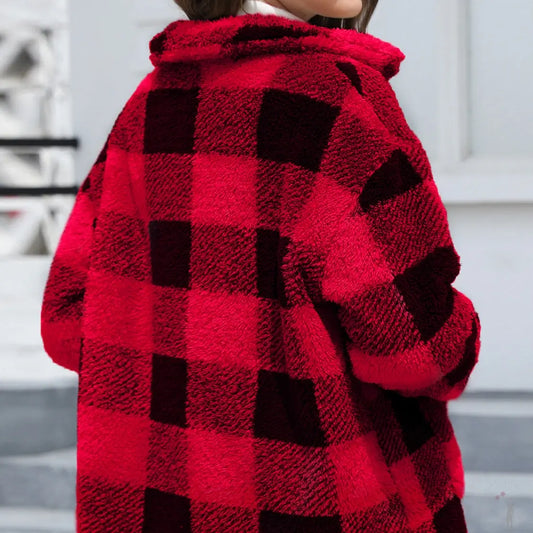 Red and black checkered coat worn by a woman showing from back view