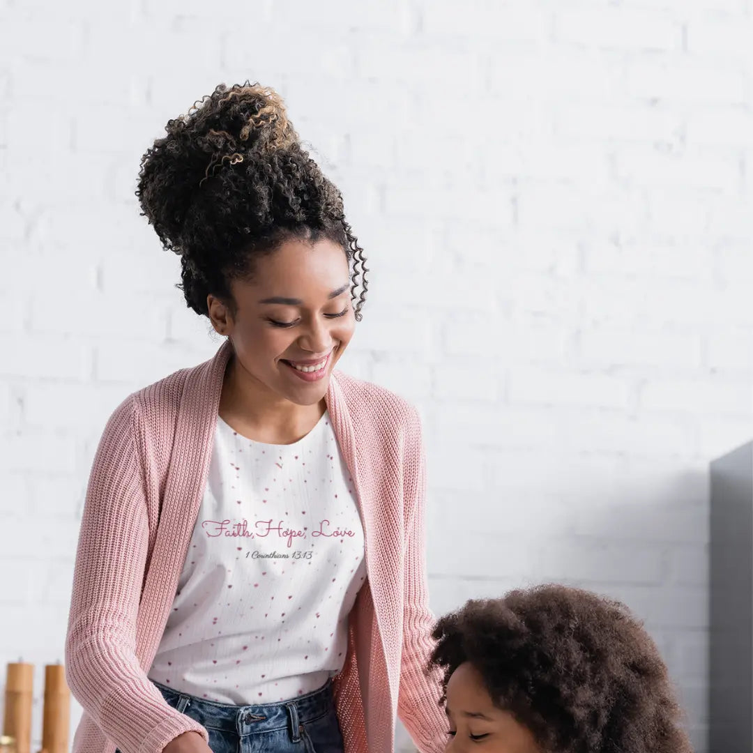 Hearts of Faith Women’s Top with delicate heart and faith-inspired details from Reach Love Connect Boutique