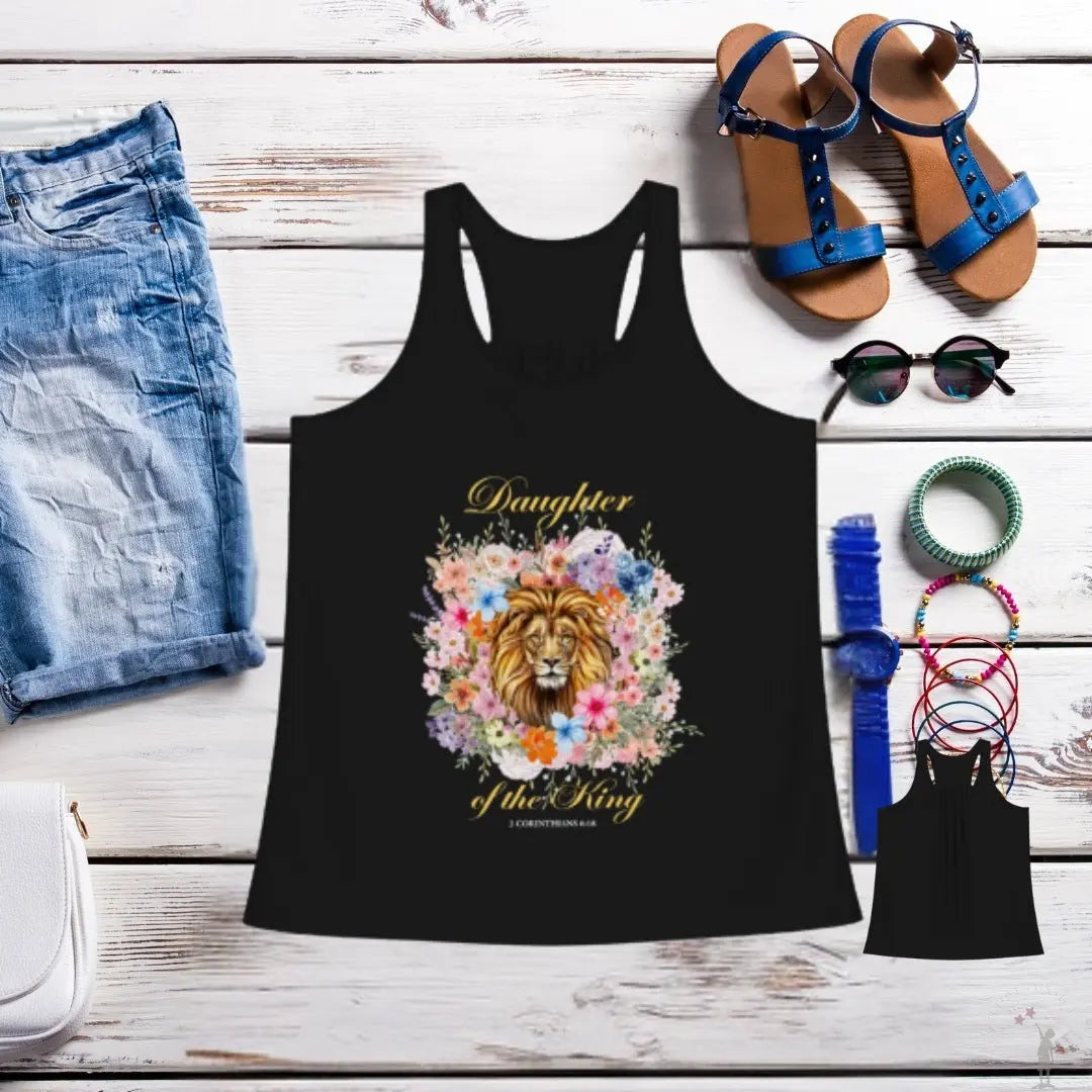 Women’s faith-based racerback tank top with Daughter of the King design, flattering fit, and soft polycotton blend, colorful flower background on black fabric