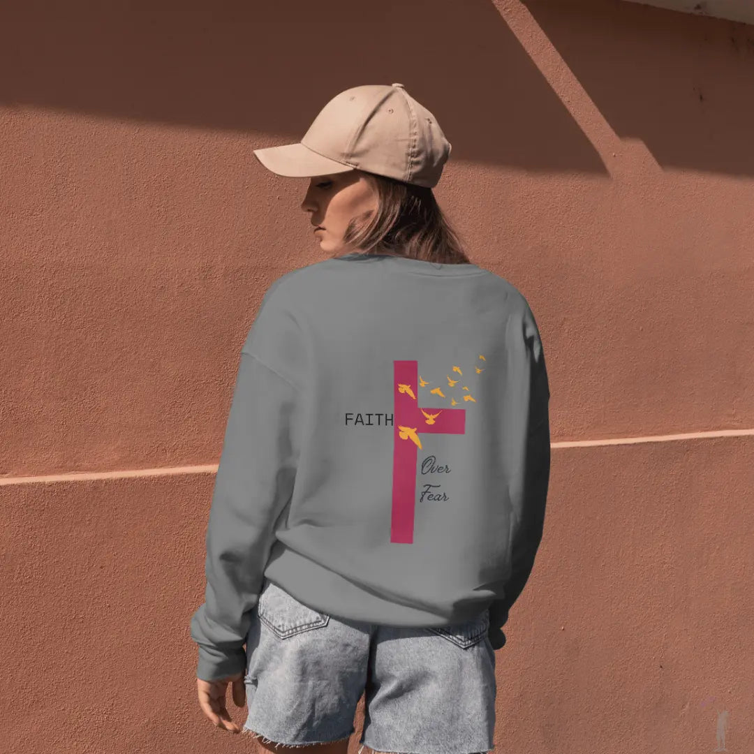 Comfortable unisex pullover hoodie with Faith Over Fear design, heavy weight fabric, and roomy pouch pocket