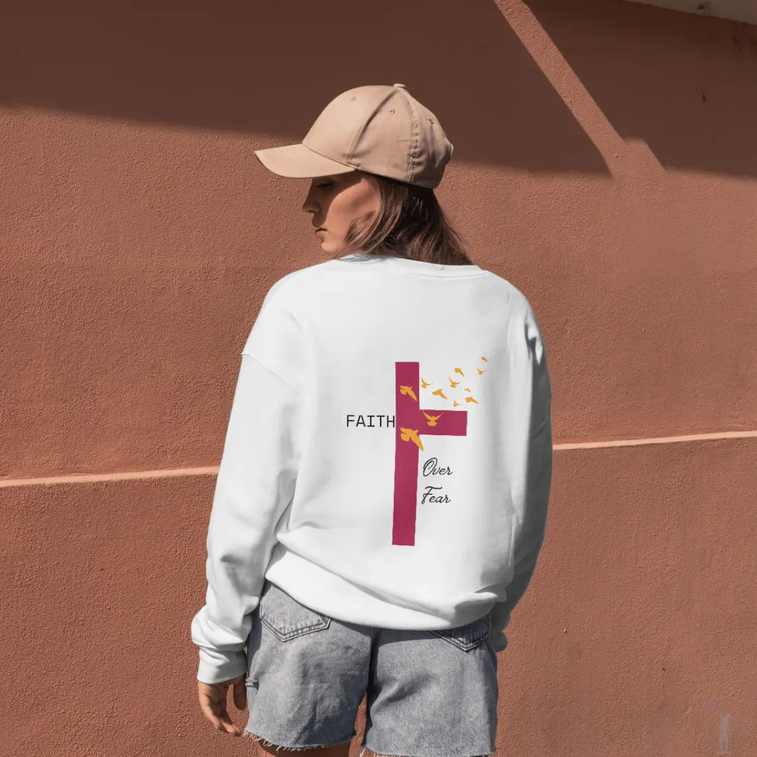Unisex pullover hoodie with faith-inspired message featuring cross and flying birds
