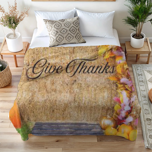Bed with 'Give Thanks' blanket featuring pumpkins and flowers - limited edition