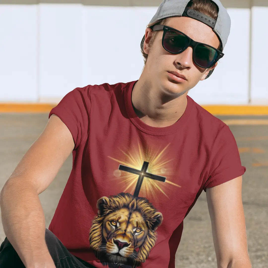 Red Unisex Tee featuring a bold graphic of a lion and a cross, symbolizing strength and faith – available at Reach Love Connect Boutique