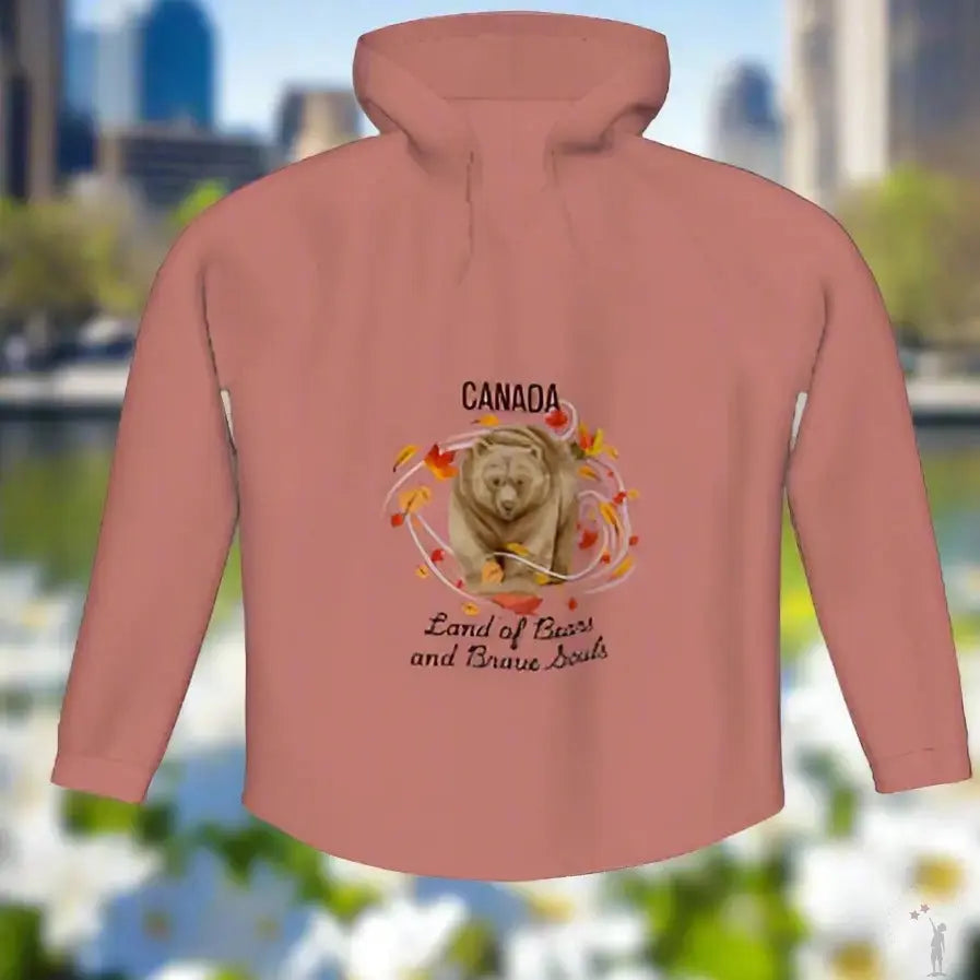 Stylish Canadian hoodie for women in soft pink with bear-themed design, relaxed drape, and soft blended fabric.