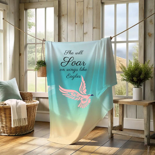 Empowering Limited Edition Women’s Day blanket in blue tones with an eagle soaring skyward, representing freedom, resilience, and grace – Reach Love Connect Boutique