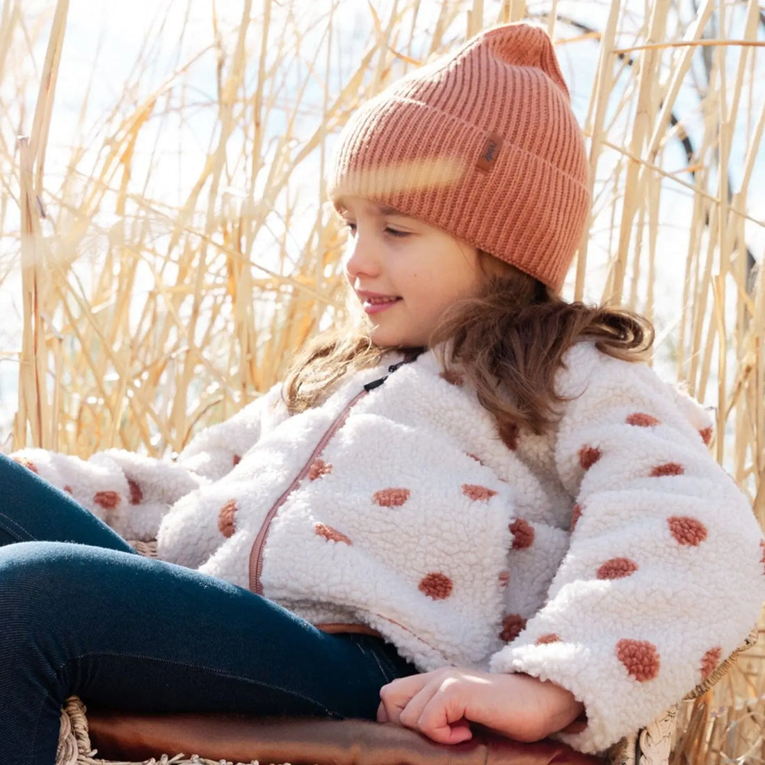 Side view of Stylish Pink Knit Hat highlighting knit detail and stretch fit