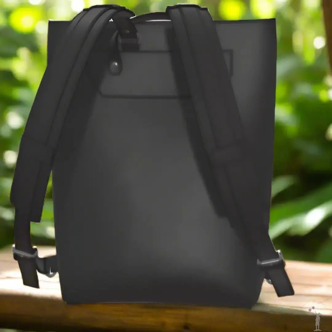 Stylish black vegan leather Christian backpack with printed Walk by Faith message, adjustable buckle straps, and durable construction