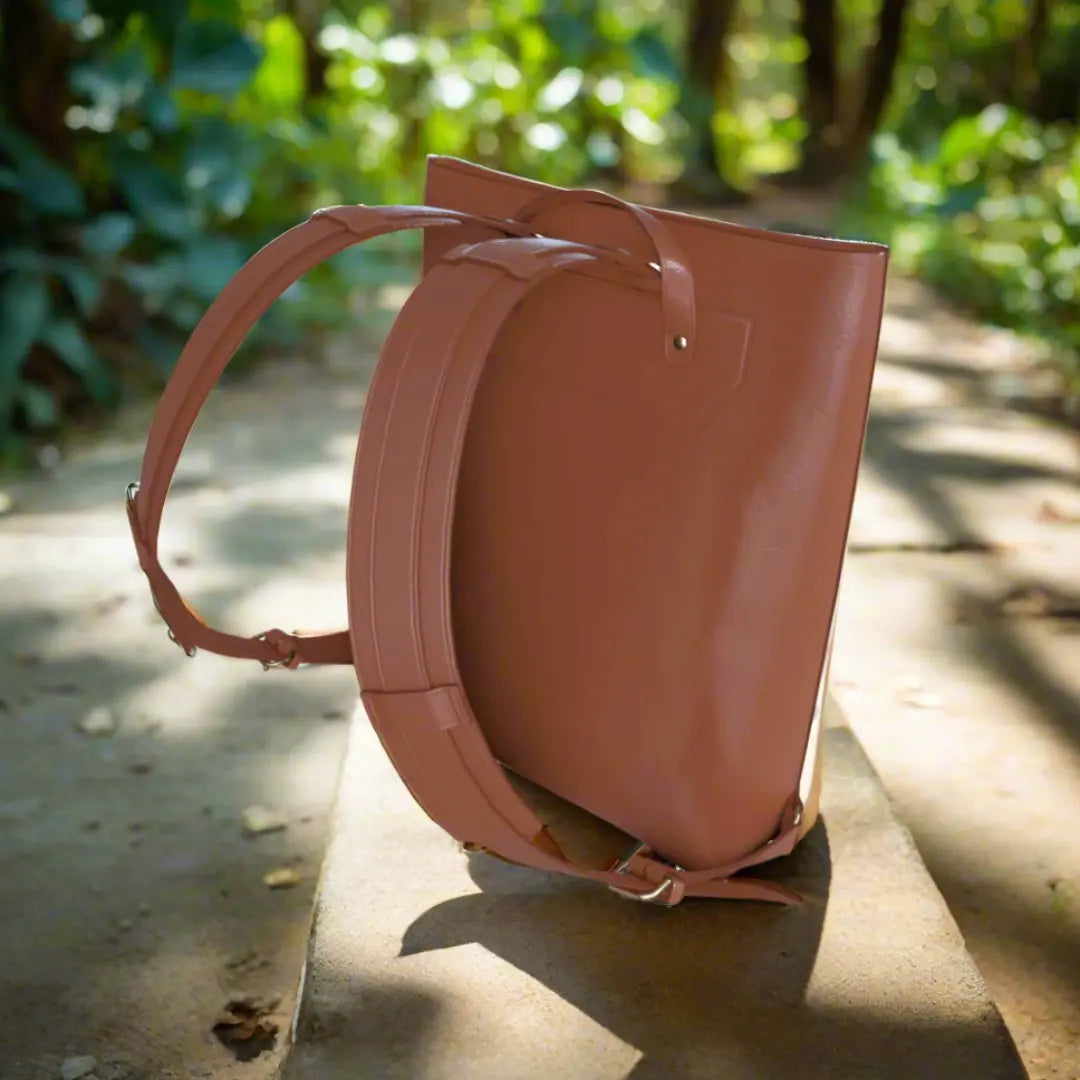 Brown Vegan leather faith backpack with Walk by Faith design, metal hardware, and removable shoulder pad for everyday use