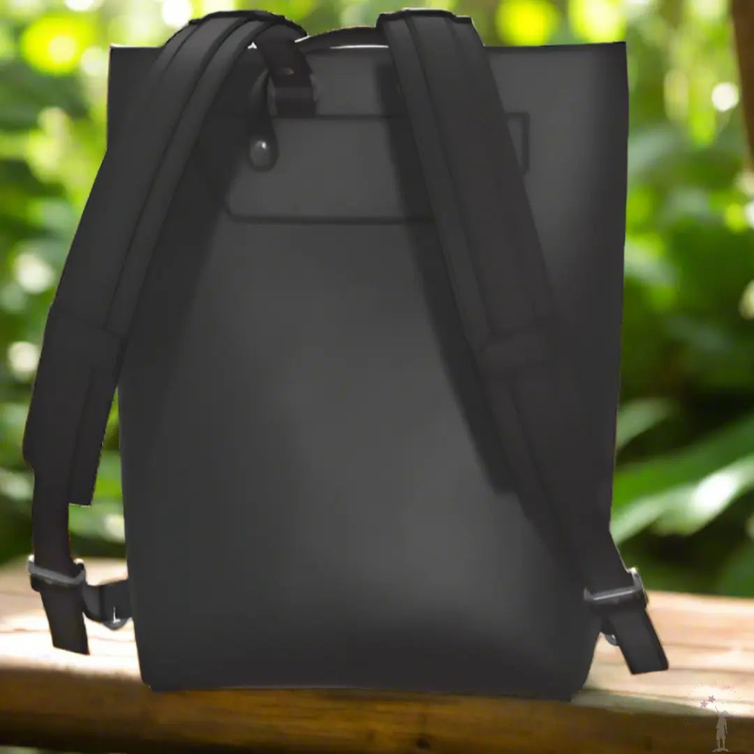 Stylish black vegan leather Christian backpack with printed Walk by Faith message, adjustable buckle straps, and durable construction