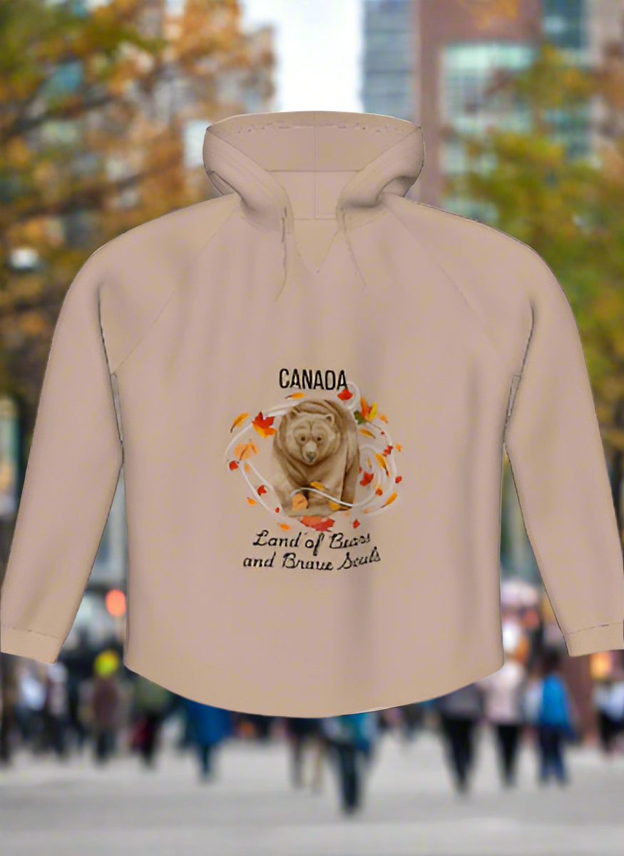 Woman wearing luxury Canadian Bears and Brave Souls Hoodie in a cozy setting